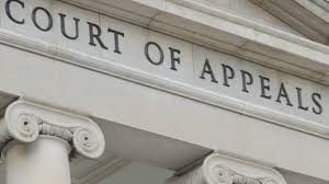 Close-up of the Court of Appeals building with classical columns and inscription.